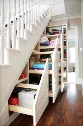 Creative storage ideas for small spaces.  LOVE this idea to create storage under the stairs.