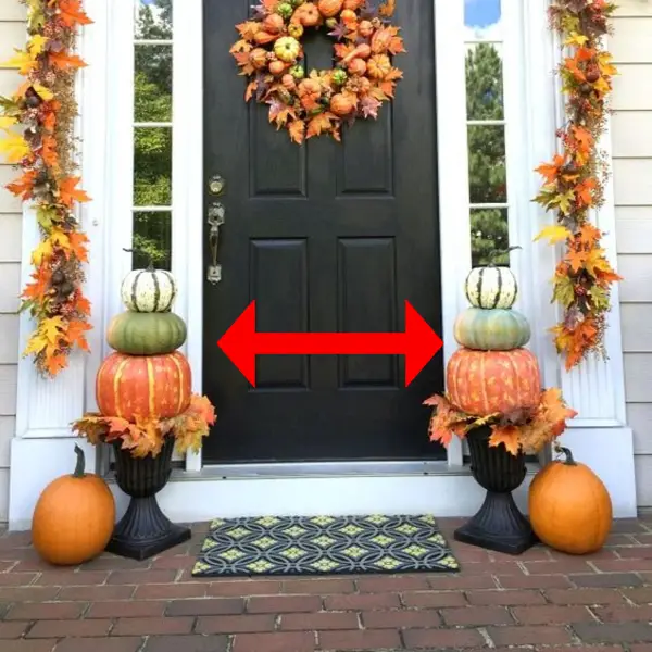 Stacking pumpkins for a Fall front porch