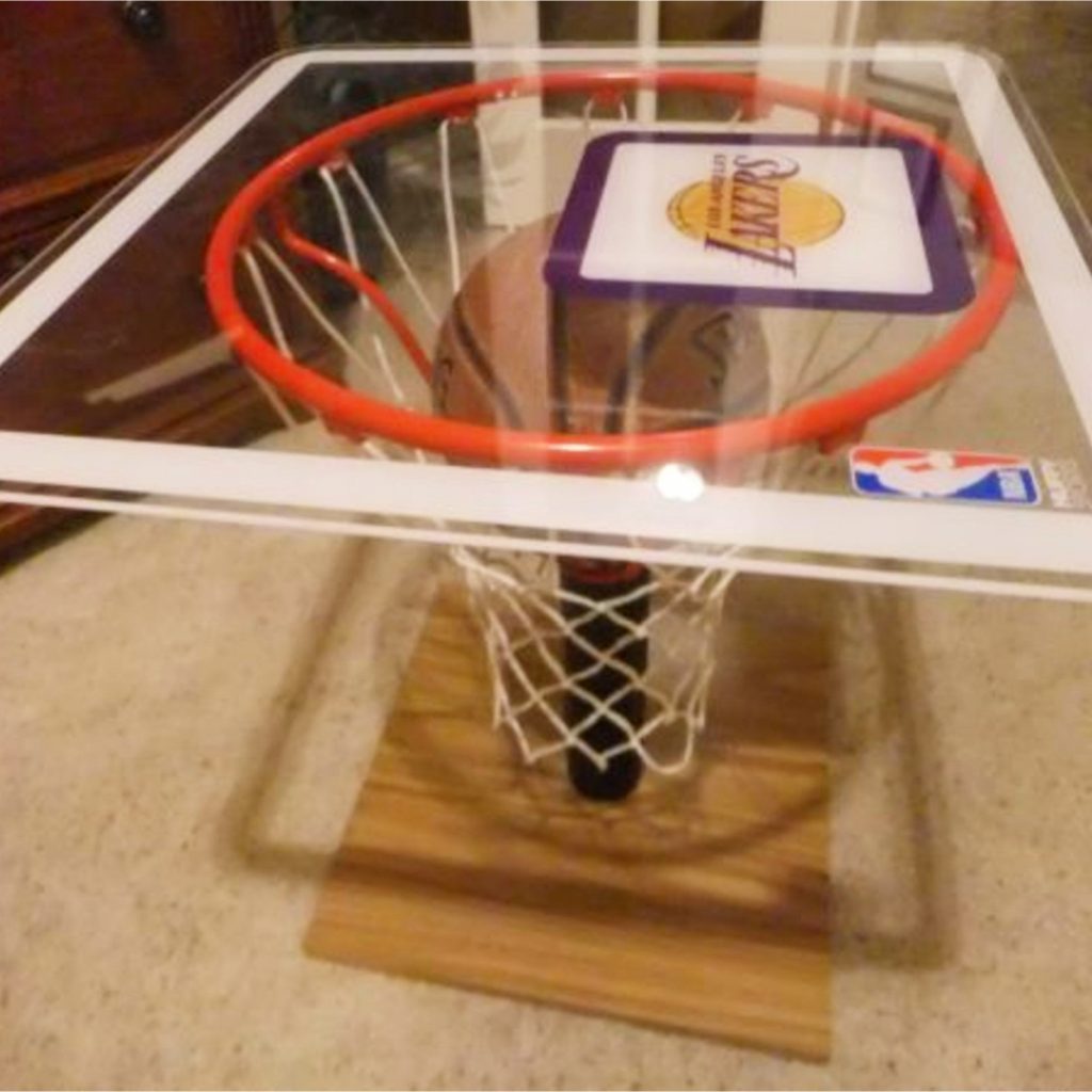 Convert a basketball net and backboard into a cool table for a garage man cave #mancaveideas #garagemancave #diyhomedecor