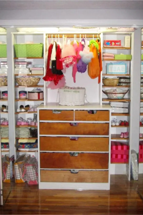 Nursery closet idea - good use of shelves and drawers for organizing baby/toddler clothes.