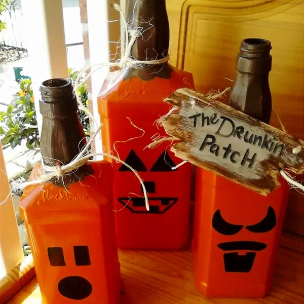 Jack Daniels Bottle Crafts - DIY Halloween decorations made from Jack Daniels whiskey bottles