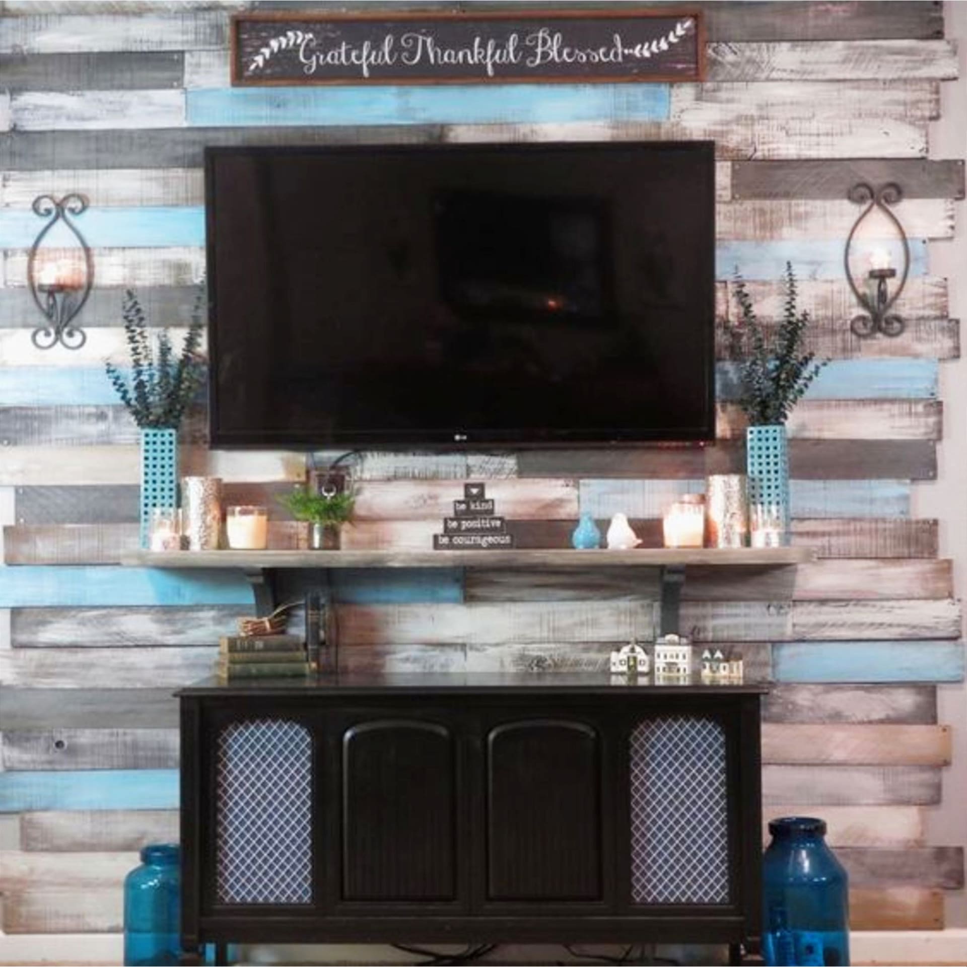 Warm and Cozy living room wall colors - living room rustic pallet wall behind TV - cozy grey small living room ideas on a budget in neutral colors with pops of color