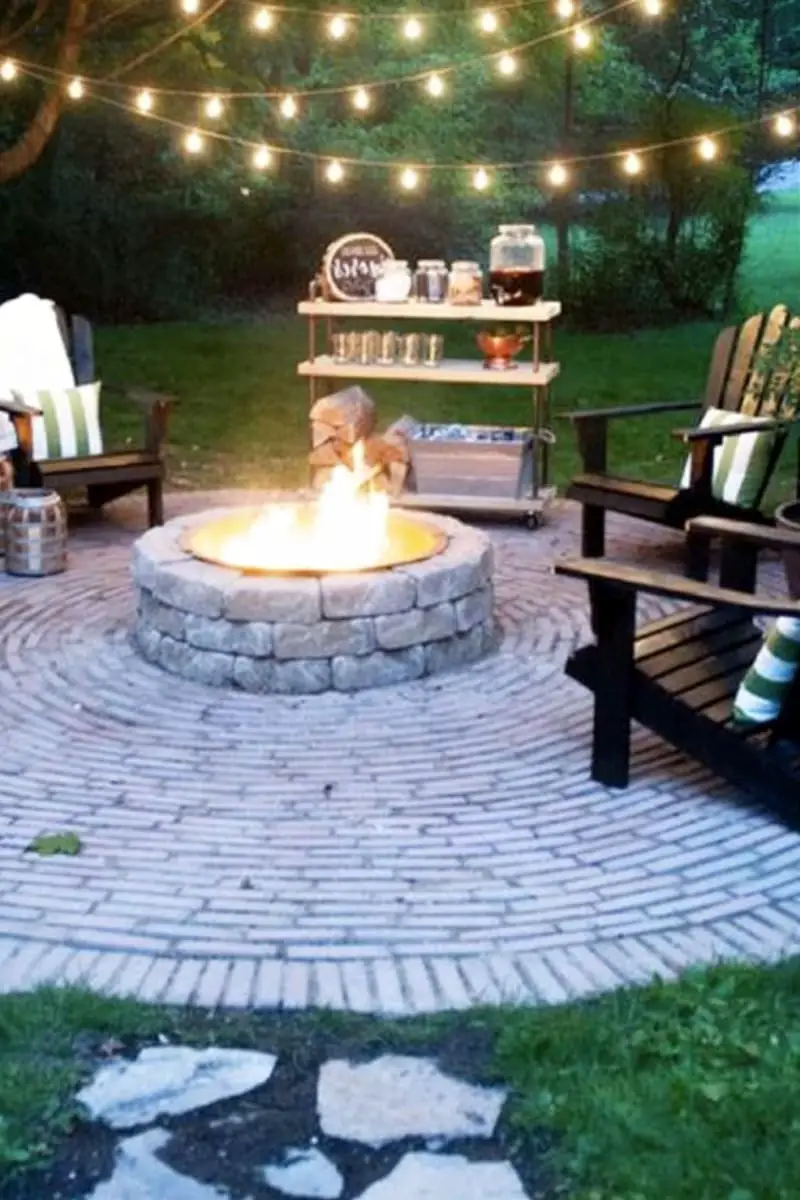 Backyard fire pit with outdoor all weather Adirondack chairs as seating