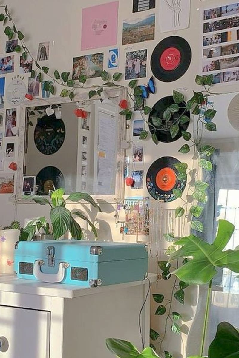 Vinyl records hung on this aesthetic room make the room look edgy with a retro vibe