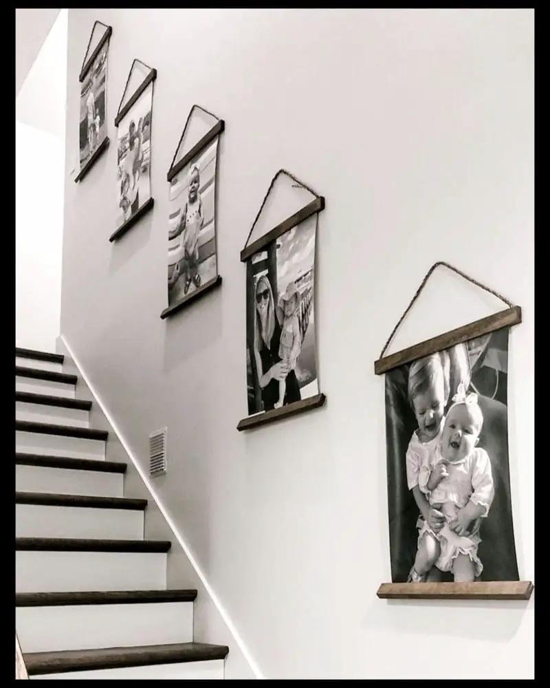 Family Photo Wall ideas - Staircase Wall Minimalist family picture wall with NO frames and black and white pictures - very modern, minimalist and tasteful